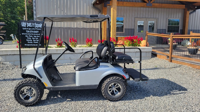 EZGO TXT 48v - Silver with Brush Guard
