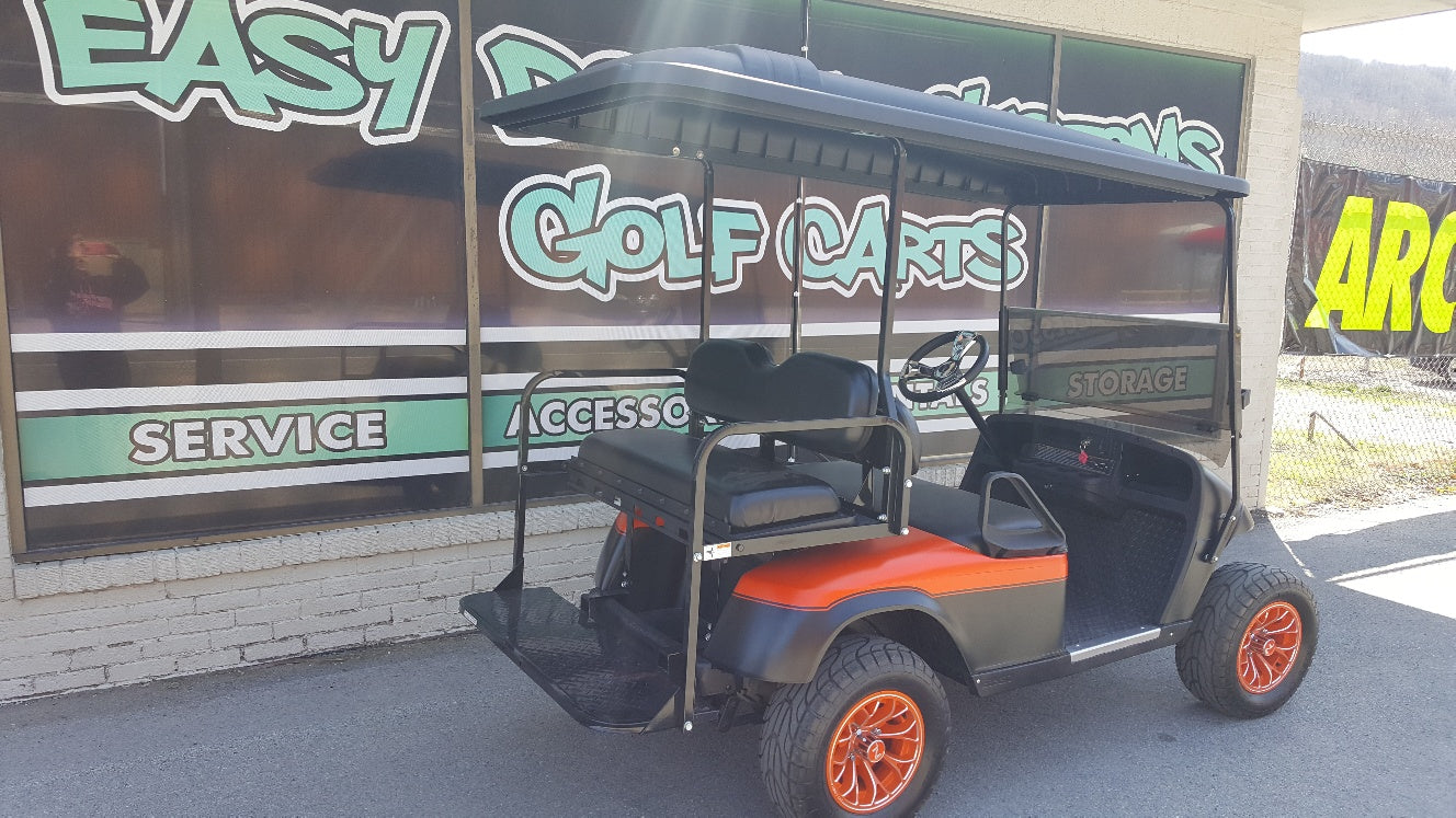 2012 Electric EZGO TXT Golf Cart with Black and Orange Matte Body - SOLD