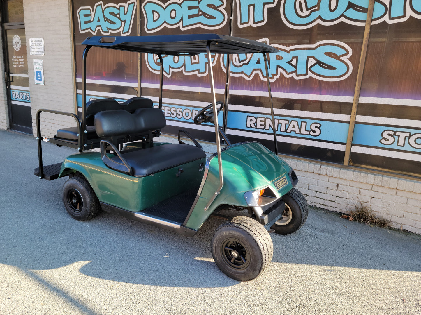 Gas EZGO TXT Golf Cart with black seats and dash SOLD